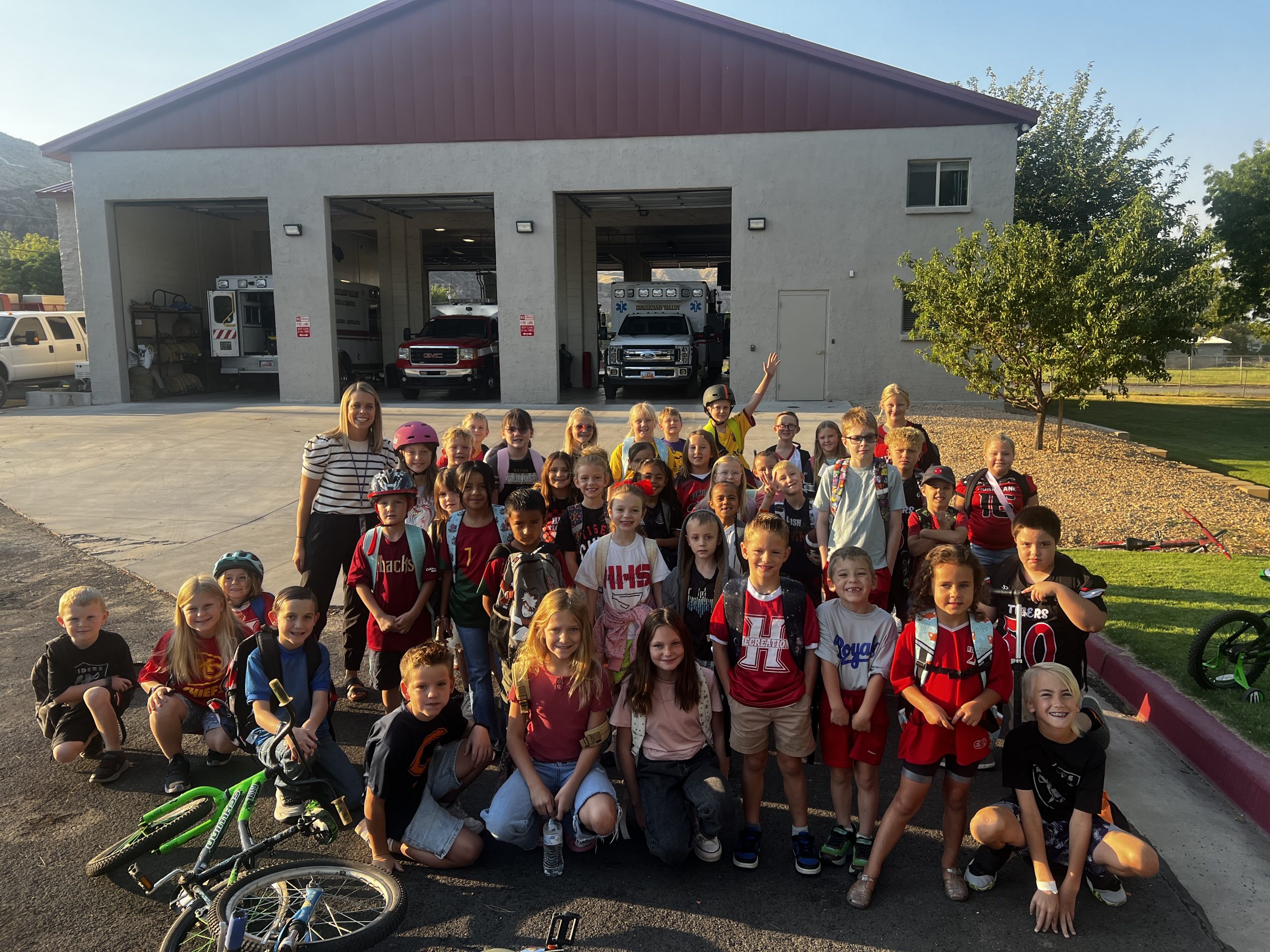 Group of students outside the fire station.