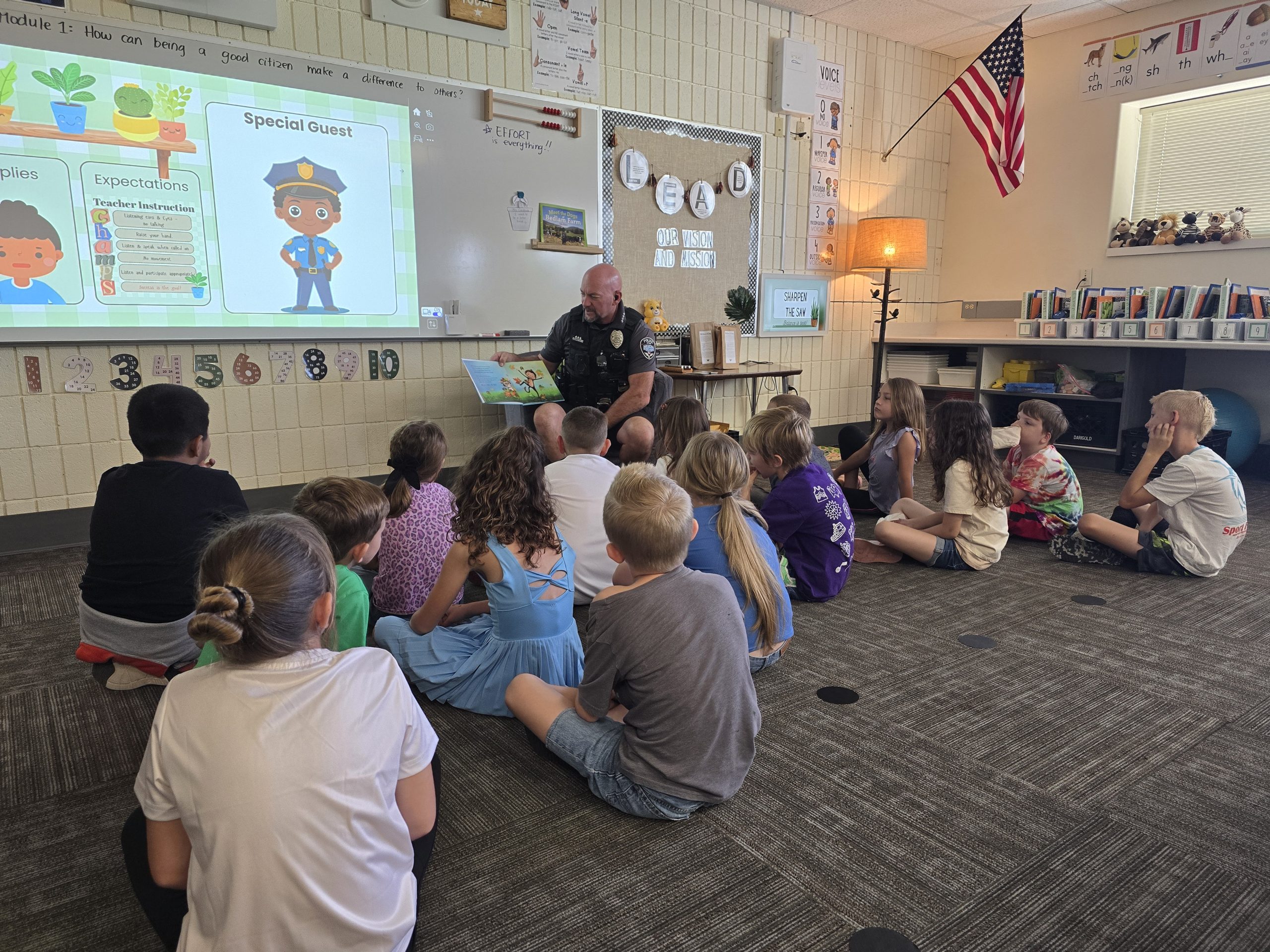 Police Chief reading to Second Grade Class